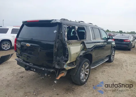 2015 Chevrolet Suburban 1500 Ltz из США, поврежденный, VIN 1GNSCKKCXFR731873